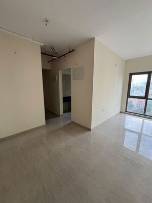 Living Room in 2 BHK Apartment at Sheth Auris Serenity Tower 3, Malad West – for Rent