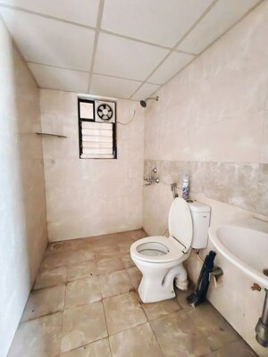 Bathroom in 2 BHK Apartment at Kolte Patil Margosa Heights, Mohammadwadi – for Sale
