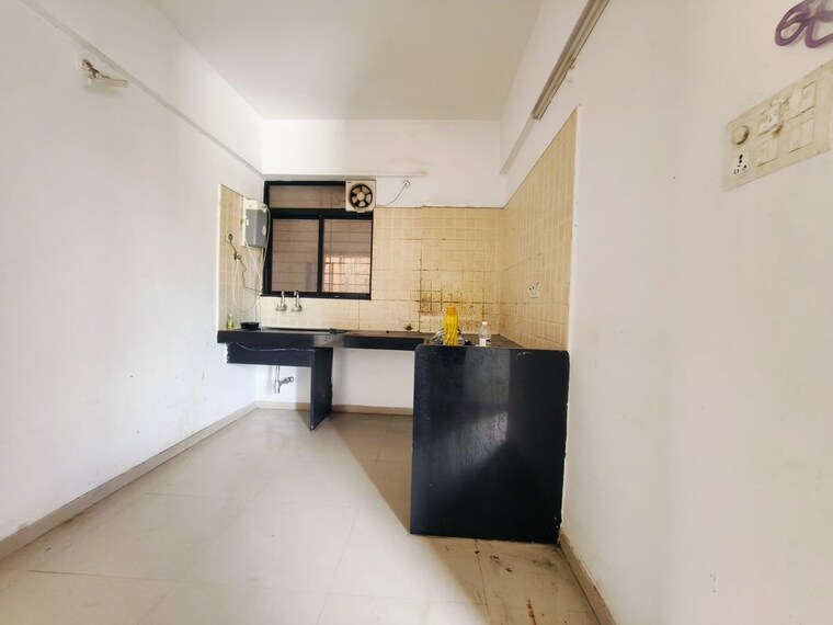 Kitchen, kolte-patil-margosa-heights 2 Bedroom 1015 Sq.Ft. Apartment In Mohammadwadi Pune 10684405