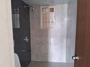 Bathroom in 2 BHK Apartment at Dosti West County, Balkum Pada – for Rent