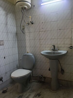 Bathroom in 4 BHK Builder Floor at Pamposh Enclave – for Rent
