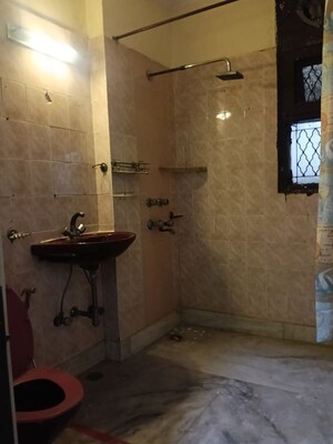 Bathroom in 4 BHK Builder Floor at Pamposh Enclave – for Rent