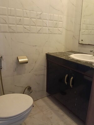Bathroom in 2 BHK Builder Floor at Nehru Enclave – for Rent