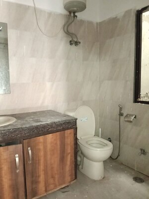 Bathroom in 2 BHK Builder Floor at Nehru Enclave – for Rent
