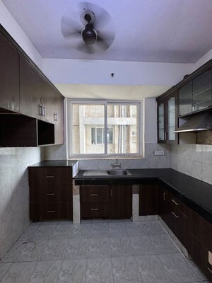 Kitchen in 3 BHK Apartment at Ansal Valley View Estate, Gwal Pahari – for Rent