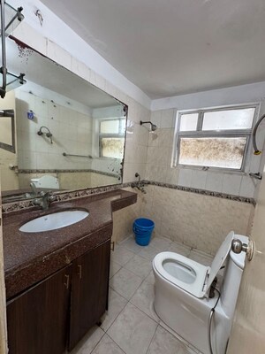Bathroom in 3 BHK Apartment at Ansal Valley View Estate, Gwal Pahari – for Rent