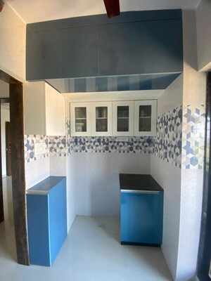 Kitchen in 1 BHK Apartment at Raunak Unnathi Woods Phase 7 A And B, Ghodbunder Road – for Rent