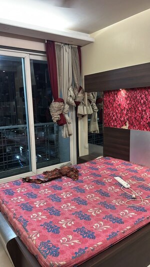 Bedroom in 2 BHK Apartment at Kesar Exotica, Kharghar Sector 10 – for Rent