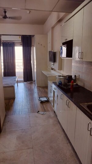Kitchen in Studio Apartment at Paramount Golfforeste, Zeta I Greater Noida – for Rent
