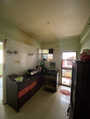 Kitchen in 2 BHK Apartment at Ghadge Patil Manik Park Residency, Bopkhel – for Sale
