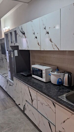 Kitchen in Studio Apartment at Paramount Golfforeste, Zeta I Greater Noida – for Rent