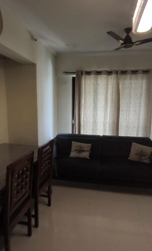 Living Room in 1 BHK Apartment at Raunak Heights, Ghodbunder Road – for Rent