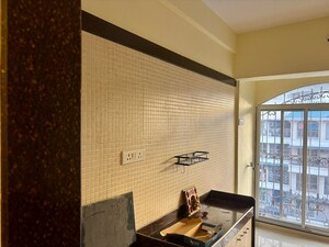 Kitchen in 2 BHK Apartment at Tharwani Heritage, Kharghar Sector 7 – for Sale