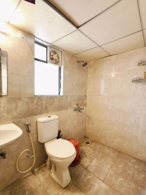 Bathroom in 1 BHK Apartment at Kolte Patil Margosa Heights, Mohammadwadi – for Rent