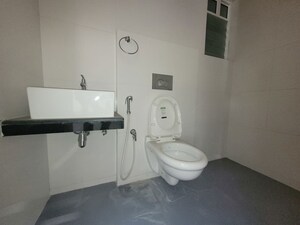 Bathroom in 2 BHK Apartment at Godrej Emerald, Ghodbunder Road – for Rent
