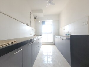 Kitchen in 2 BHK Apartment at Godrej Emerald, Ghodbunder Road – for Rent