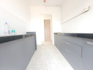 Kitchen in 2 BHK Apartment at Godrej Emerald, Ghodbunder Road – for Rent