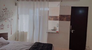 Bedroom in 1 RK Builder Floor at Mahindra Aura, Sector 110a – for Rent