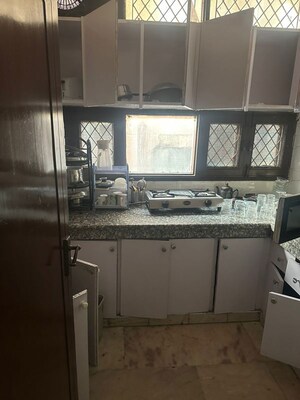 Kitchen in 2 BHK Builder Floor at Kailash Colony – for Rent