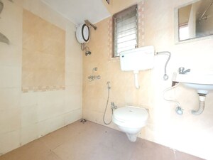 Bathroom in 3 BHK Apartment at Godrej Emerald, Ghodbunder Road – for Rent