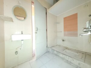 Bathroom in 3 BHK Apartment at Godrej Emerald, Ghodbunder Road – for Rent
