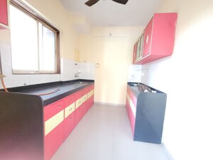 Kitchen in 3 BHK Apartment at Godrej Emerald, Ghodbunder Road – for Rent