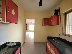 Kitchen in 3 BHK Apartment at Godrej Emerald, Ghodbunder Road – for Rent