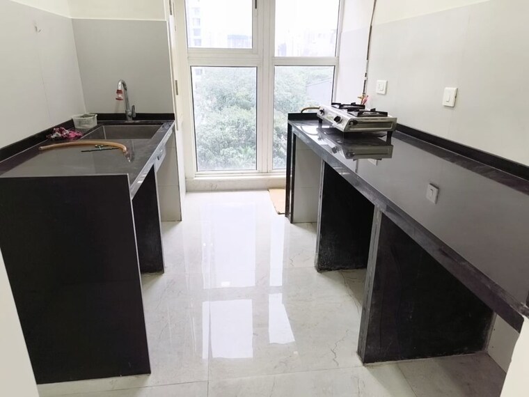 Kitchen, tata-serein 2 Bedroom 688 Sq.Ft. Apartment In Pokhran Road No Two Thane 10684915