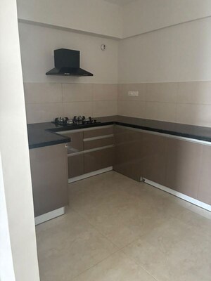 Kitchen in 3 BHK Apartment at Gera World of Joy, Kharadi – for Sale