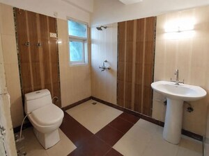 Bathroom in 2 BHK Apartment at Meenal Balmukund Residency, Raj Nagar Extension – for Sale