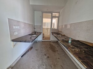 Kitchen in 3 BHK Apartment at Mahagun Mirabella, Sector 79 – for Sale