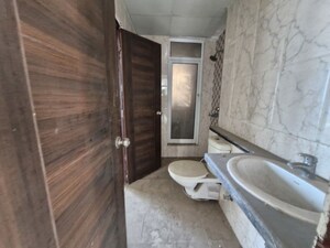 Bathroom in 3 BHK Apartment at Mahagun Mirabella, Sector 79 – for Sale