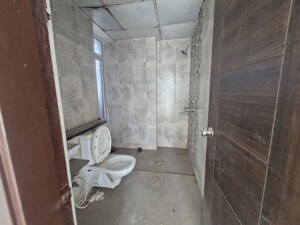 Bathroom in 3 BHK Apartment at Mahagun Mirabella, Sector 79 – for Sale