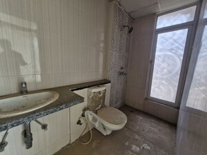 Bathroom in 3 BHK Apartment at Mahagun Mirabella, Sector 79 – for Sale