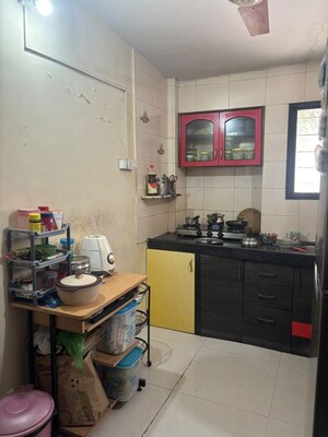 Kitchen in 1 BHK Apartment at Ganga Puram CHS, Viman Nagar – for Rent