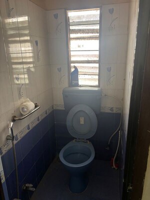 Bathroom in 1 BHK Apartment at Ganga Puram CHS, Viman Nagar – for Rent