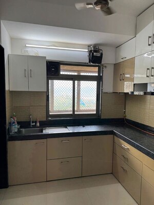Kitchen in 3 BHK Apartment at Lodha Splendora River View, Ghodbunder Road – for Rent