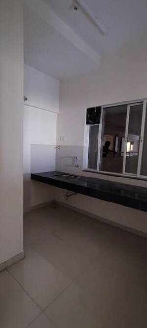 Kitchen in 2 BHK Apartment at Megapolis Symphony, Hinjewadi – for Sale