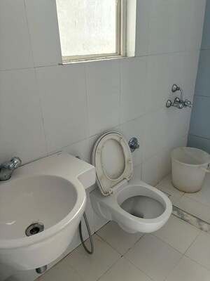 Bathroom in 2 BHK Apartment at Karia Konark Orchid, Wagholi – for Rent