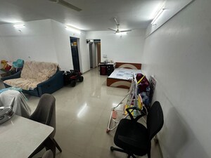 Living Room in 2 BHK Apartment at Karia Konark Orchid, Wagholi – for Sale
