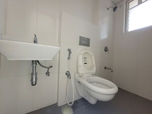 Bathroom in 3 BHK Apartment at Godrej Emerald, Ghodbunder Road – for Rent