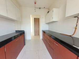 Kitchen in 3 BHK Apartment at Godrej Emerald, Ghodbunder Road – for Rent