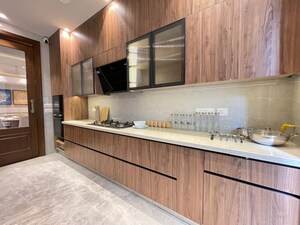 Kitchen in 4 BHK Apartment at Vasant Vihar – for Rent