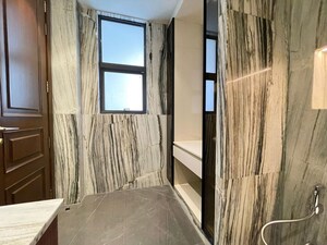 Bathroom in 4 BHK Apartment at Vasant Vihar – for Rent