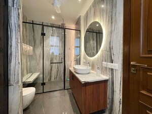 Bathroom in 4 BHK Apartment at Vasant Vihar – for Rent