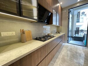 Kitchen in 4 BHK Apartment at Vasant Vihar – for Rent