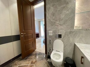 Bathroom in 4 BHK Apartment at Vasant Vihar – for Rent