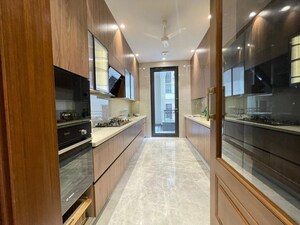 Kitchen in 4 BHK Apartment at Vasant Vihar – for Rent