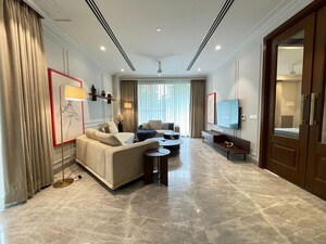 Living Room in 4 BHK Apartment at Vasant Vihar – for Rent