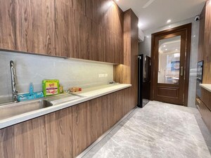 Kitchen in 4 BHK Apartment at Vasant Vihar – for Rent